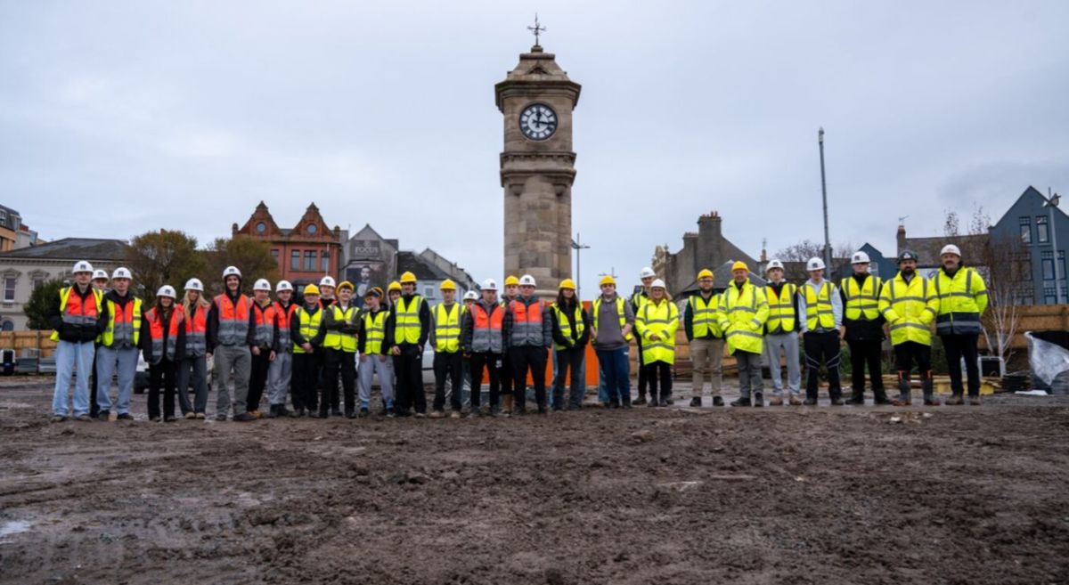 Picture of construction students at Bangor Marine construction project. 